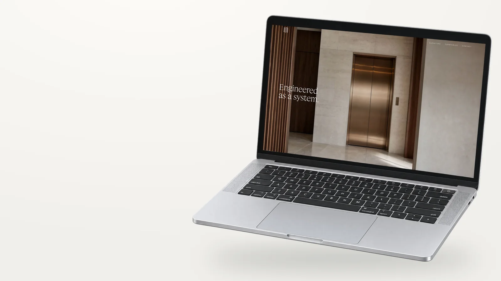 Alto Elevators website on a laptop