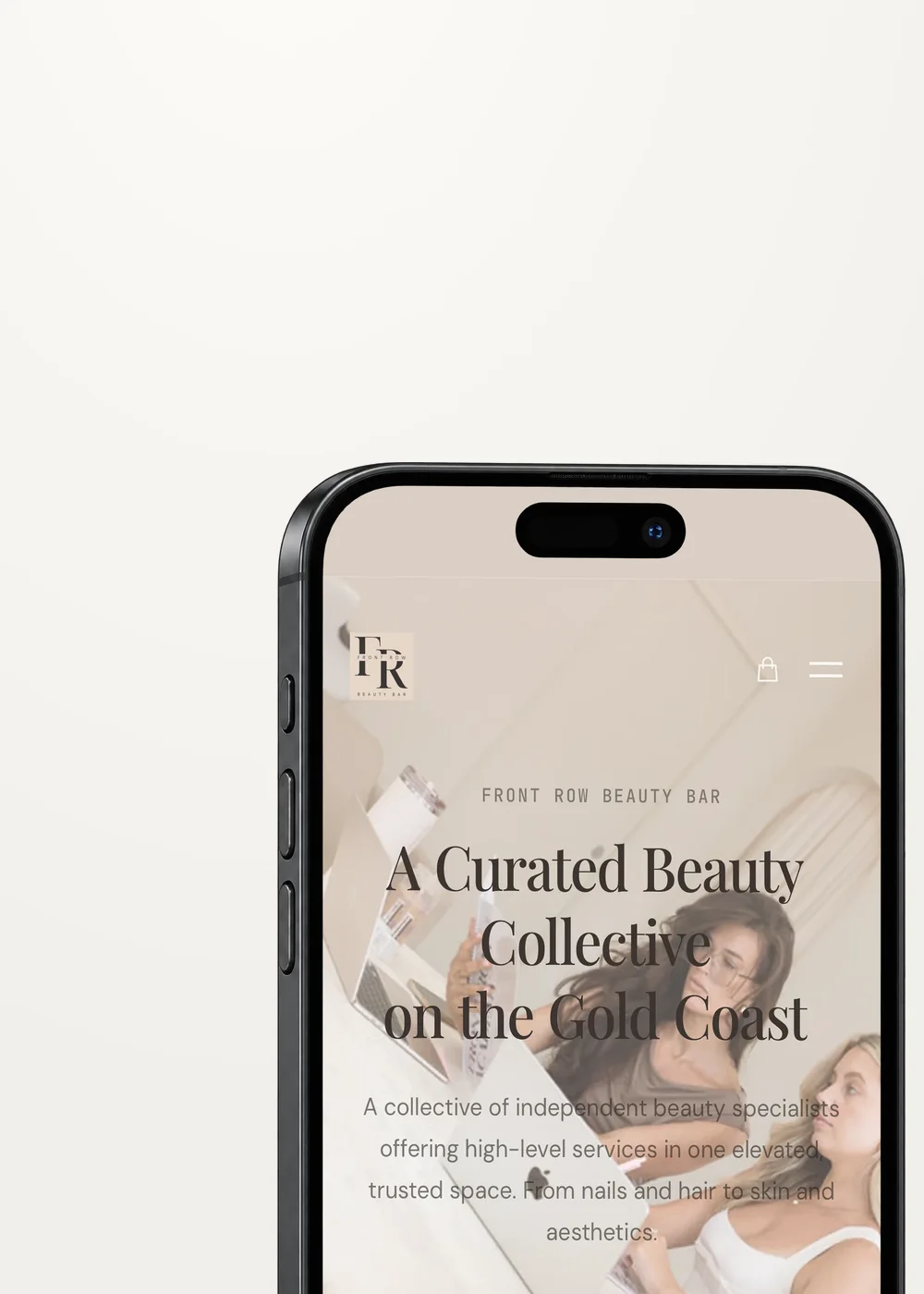 Front Row Beauty Bar website on a phone