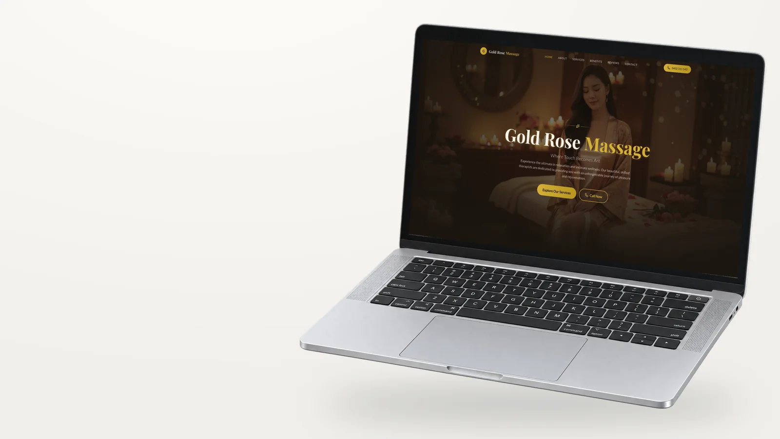 Gold Rose Massage website on a laptop