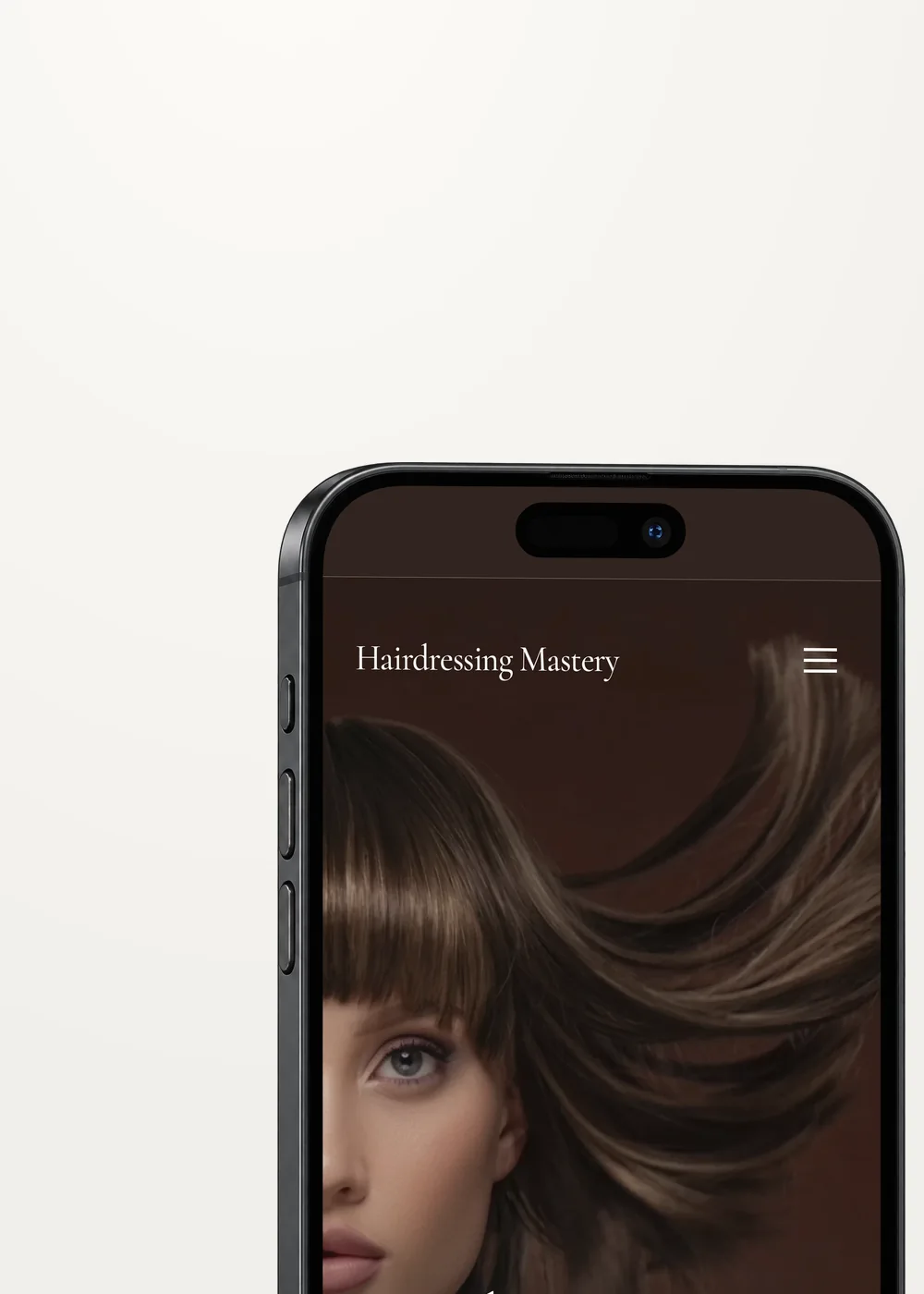 Hairdressing Mastery website on a phone
