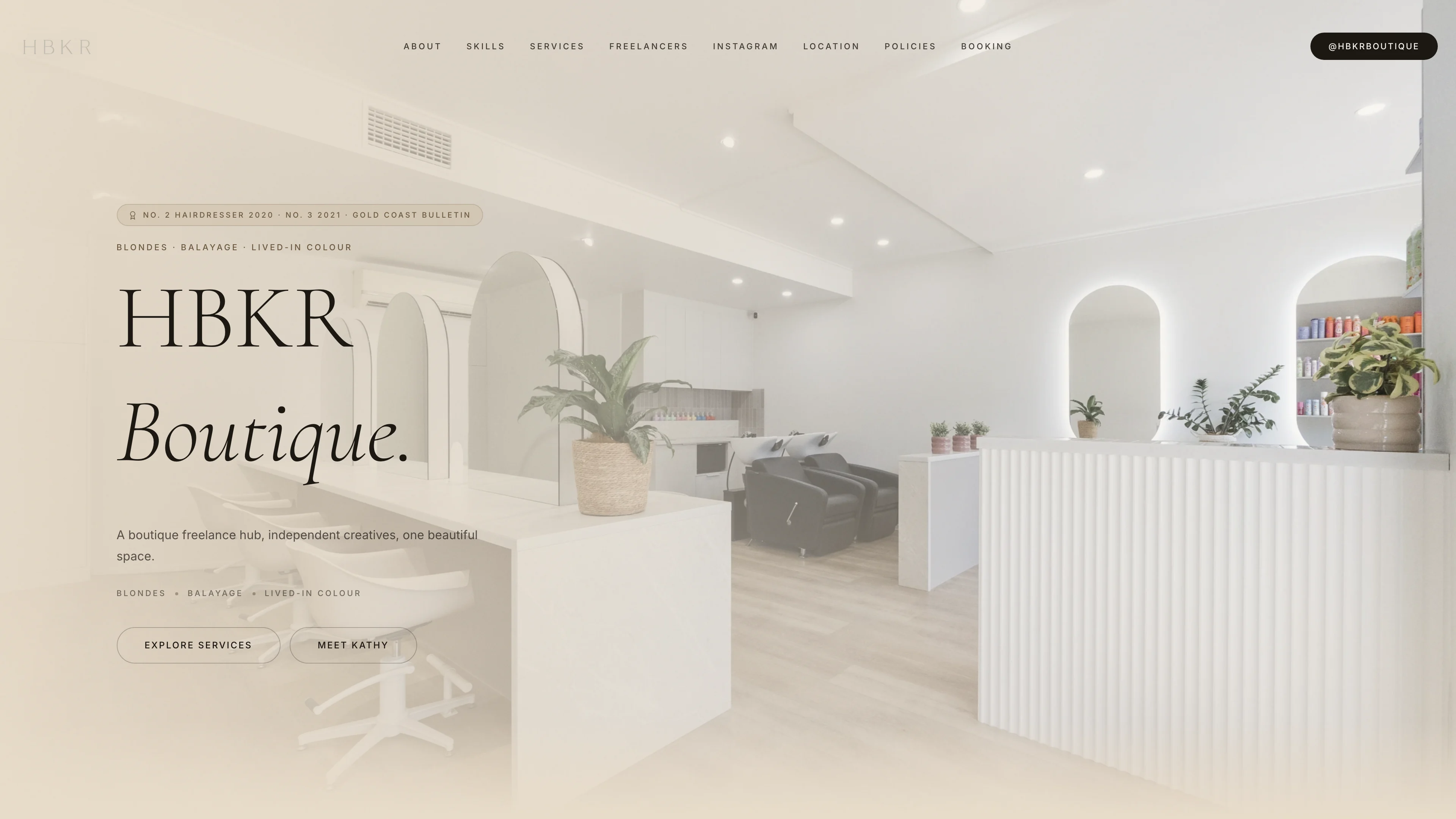 HBKR Boutique homepage with salon interior photography and service navigation, shown in a desktop browser view