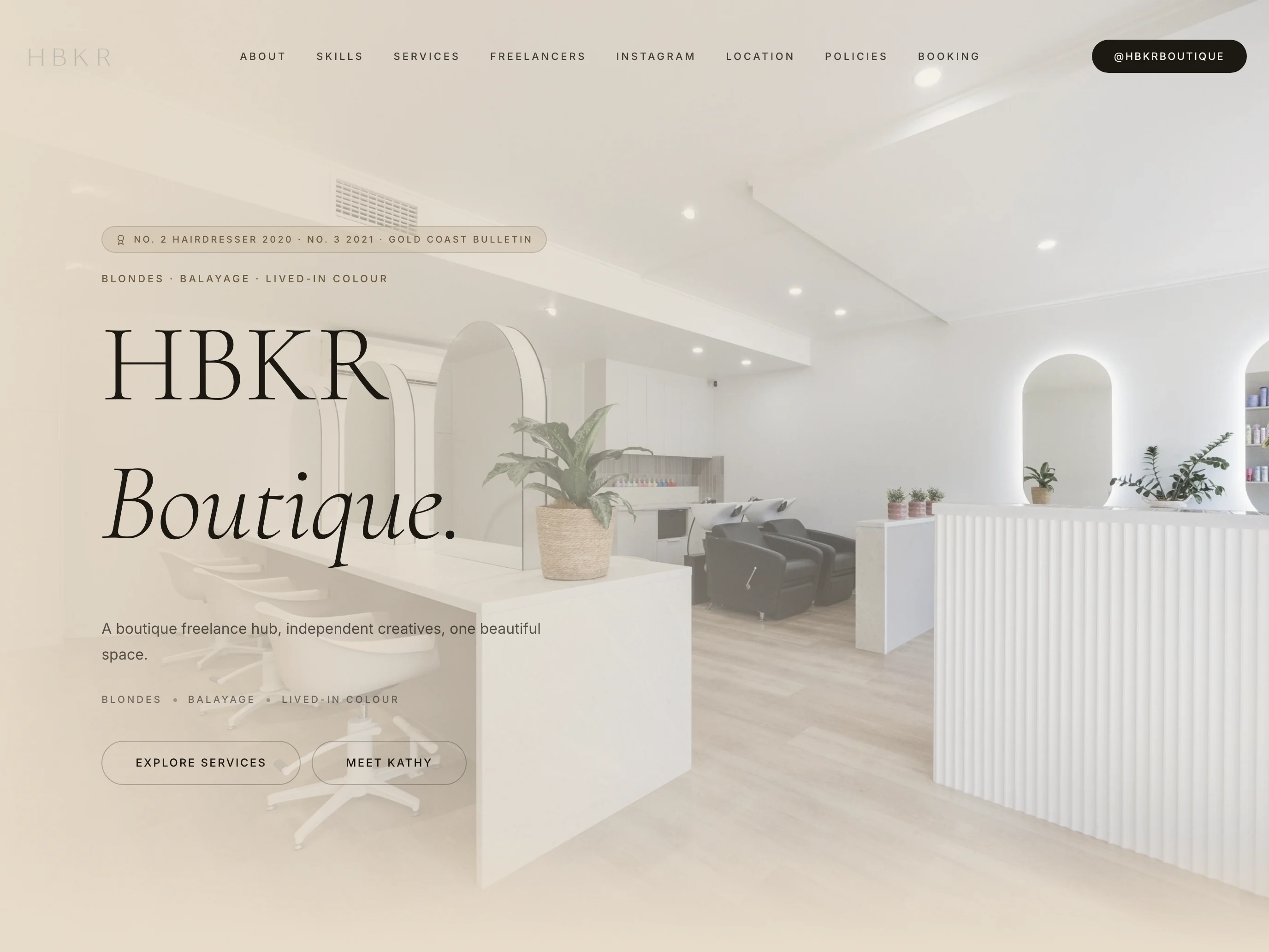 HBKR Boutique homepage with salon interior photography and service navigation, shown in a tablet browser view