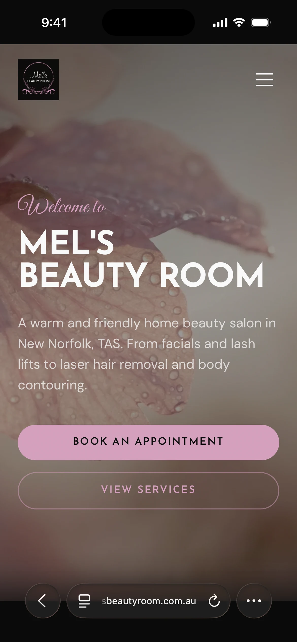 Mel's Beauty Room homepage with its name over pink orchid photography and appointment and service links (mobile view)