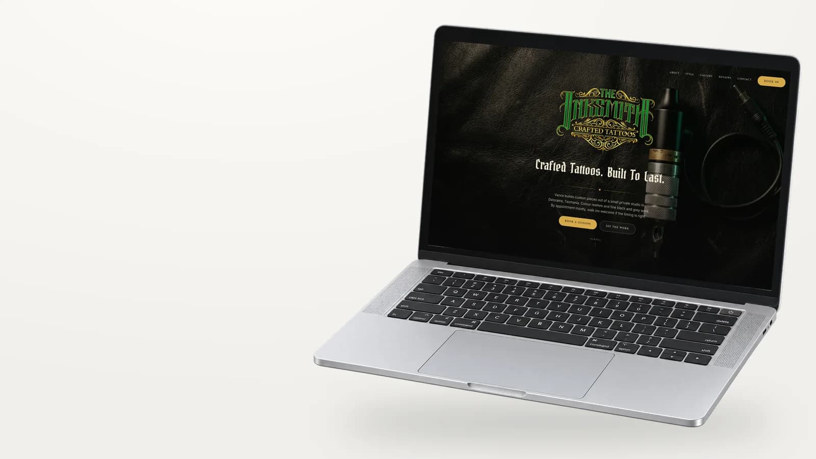 The Inksmith website on a laptop