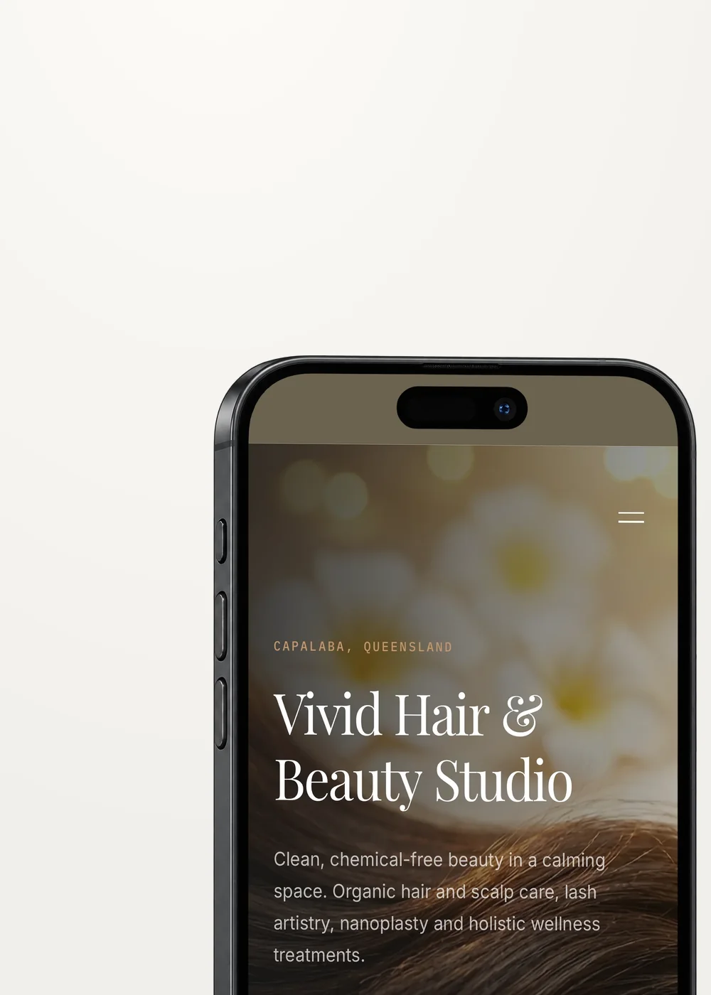 Vivid Hair and Beauty website on a phone